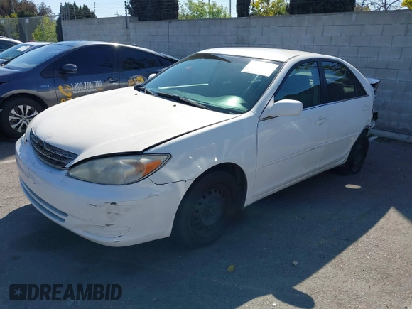 2004 Toyota Camry LE with VIN 4T1BE32KX4U284600, listed as a IAAI auction lot 41855214 with 116,758 mi miles. Bid and sale history available at carsss.com. Image 18.