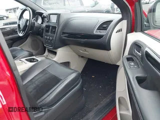 2014 Dodge Grand Caravan SXT with VIN 2C4RDGCG3ER257695, listed as a IAAI auction lot 41534568 with 116,896 mi miles and . Bid and sale history available at DreamBid. Image 5.