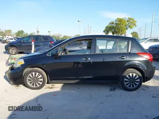 2009 Nissan Versa 1.8 SL with VIN 3N1BC13E79L476570, listed as a IAAI auction lot 41804750 with 160,449 mi miles. Bid and sale history available at carsss.com. Image 14.