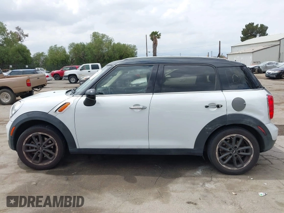 2015 MINI Countryman with VIN WMWZB3C57FWR46707, listed as a IAAI auction lot 42114457 with 137,356 mi miles and . Bid and sale history available at DreamBid. Image 14.