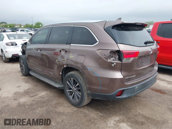 2017 Toyota Highlander XLE with VIN 5TDKZRFH1HS201561, listed as a IAAI auction lot 41841439 with 110,644 mi miles and . Bid and sale history available at DreamBid. Image 3.