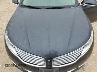 2014 Lincoln MKZ z VIN 3LN6L2JK7ER827185, wystawiony jako Copart lot #44064305 z przebiegiem 87 837 mil mil oraz Szkoda całkowita • Salvage title. Historia ofert i sprzedaży dostępna na DreamBid. Obrazek 12.