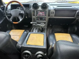 2003 Hummer H2 z VIN 5GRGN23U53H141743, wystawiony jako Copart lot #60153185 z przebiegiem 137 863 mil mil oraz Czysty tytuł • Clean title. Historia ofert i sprzedaży dostępna na DreamBid. Obrazek 9.