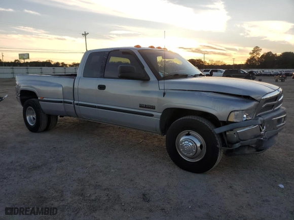 1999 Dodge Ram 3500 with VIN 1B7MC3361XJ646338, listed as a Copart auction lot 82956324 with 180,651 mi miles and Salvage Title. Bid and sale history available at carsss.com. Image 4.