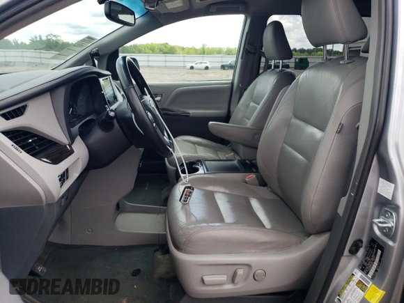 2015 Toyota Sienna XLE with VIN 5TDYK3DC0FS592251, listed as a Copart auction lot 60126165 with 118,925 mi miles and Salvage title. Bid and sale history available at DreamBid. Image 7.