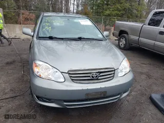 2003 Toyota Corolla CE with VIN JTDBR32E732016827, listed as a IAAI auction lot 41545055 with 140,845 mi miles. Bid and sale history available at carsss.com. Image 12.