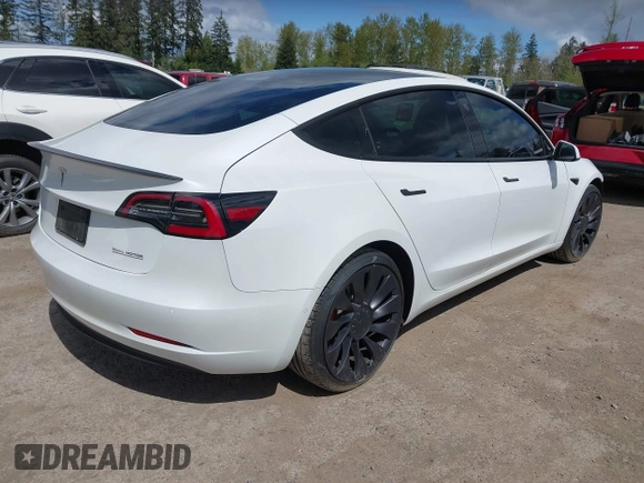 2021 Tesla Model 3 Performance with VIN 5YJ3E1EC2MF096681, listed as a IAAI auction lot 42068782 with 34,852 mi miles and . Bid and sale history available at DreamBid. Image 4.