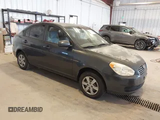 2010 Hyundai Accent GLS z VIN KMHCN4AC0AU423407, wystawiony jako IAAI lot #42428621 z przebiegiem 132 654 mil mil oraz . Historia ofert i sprzedaży dostępna na DreamBid. Obrazek 1.