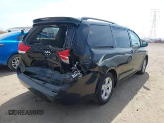 2014 Toyota Sienna LE AAS with VIN 5TDKK3DC6ES499478, listed as a IAAI auction lot 41918474 with 127,734 mi miles and . Bid and sale history available at carsss.com. Image 6.