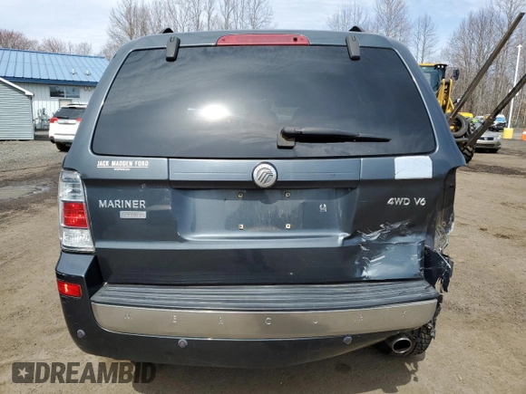 2008 Mercury Mariner Premier z VIN 4M2CU97178KJ40982, wystawiony jako Copart lot #51683375 z przebiegiem 127 132 mil mil oraz Szkody całkowita. Historia ofert i sprzedaży dostępna na DreamBid. Obrazek 6.