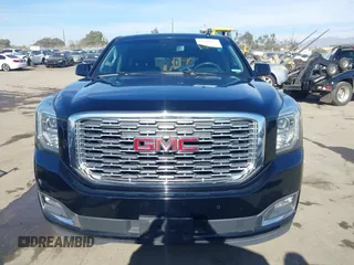 2019 GMC Yukon Denali with VIN 1GKS2CKJ4KR191886, listed as a IAAI auction lot 41198227 with 74,325 mi miles. Bid and sale history available at carsss.com. Image 12.