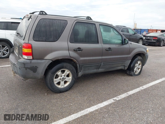 2005 Ford Escape XLT with VIN 1FMYU03145KD73027, listed as a IAAI auction lot 41932192 with Not Provided miles and . Bid and sale history available at DreamBid. Image 4.
