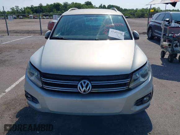 2012 Volkswagen Tiguan SE with VIN WVGAV7AX9CW581957, listed as a IAAI auction lot 42407148 with 135,553 mi miles and . Bid and sale history available at DreamBid. Image 6.