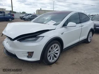 2020 Tesla Model X Long Range with VIN 5YJXCBE26LF234855, listed as a IAAI auction lot 41420701 with 101,202 mi miles. Bid and sale history available at carsss.com. Image 18.