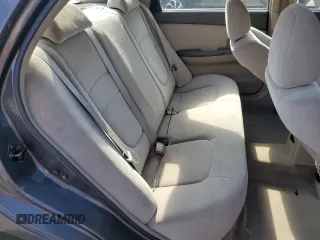 2006 Kia Spectra EX with VIN KNAFE122X65270684, listed as a Copart auction lot 73002454 with 79,326 mi miles and Salvage Title. Bid and sale history available at carsss.com. Image 10.