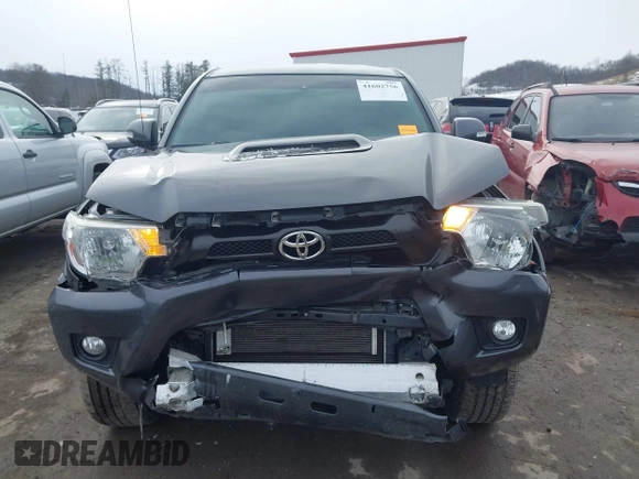 2014 Toyota Tacoma with VIN 3TMLU4EN1EM148353, listed as a IAAI auction lot 41602756 with 89,563 mi miles. Bid and sale history available at carsss.com. Image 13.