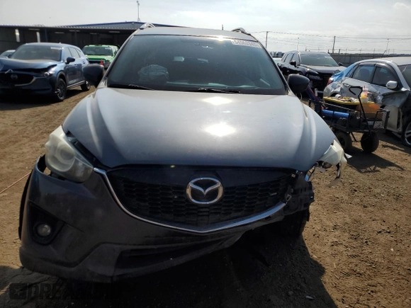 2014 Mazda CX-5 Sport z VIN JM3KE4BE1E0359446, wystawiony jako Copart lot #54562545 z przebiegiem 128 150 mil mil oraz Szkoda całkowita • Salvage title. Historia ofert i sprzedaży dostępna na DreamBid. Obrazek 5.