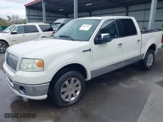 2006 Lincoln Mark LT with VIN 5LTPW18516FJ22601, listed as a IAAI auction lot 41819967 with 231,890 mi miles. Bid and sale history available at carsss.com. Image 2.
