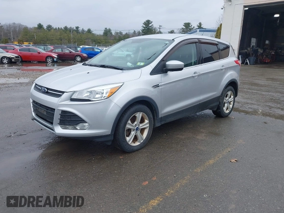 2015 Ford Escape SE with VIN 1FMCU9GX0FUB99881, listed as a IAAI auction lot 41919660 with 138,561 mi miles. Bid and sale history available at carsss.com. Image 2.