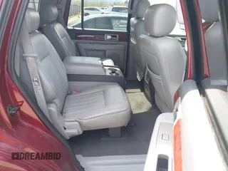 2004 Lincoln Navigator Luxury with VIN 5LMFU28R14LJ15068, listed as a IAAI auction lot 42078597 with 150,294 mi miles. Bid and sale history available at carsss.com. Image 8.
