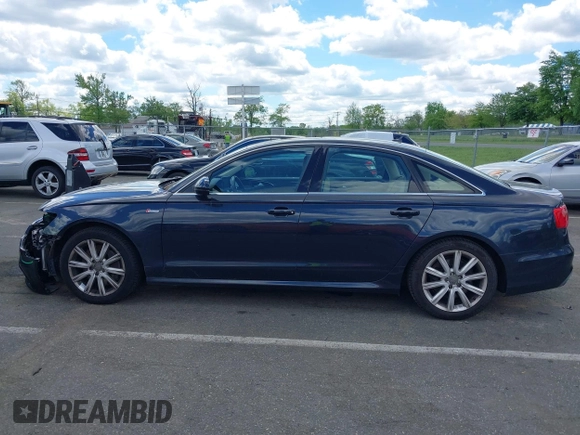 2013 Audi A6 Prestige z VIN WAUJGAFC6DN005023, wystawiony jako IAAI lot #42201985 z przebiegiem 80 337 mil mil oraz . Historia ofert i sprzedaży dostępna na DreamBid. Obrazek 14.