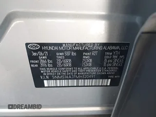 2021 Hyundai Santa Fe SE with VIN 5NMS14AJ7MH320491, listed as a IAAI auction lot 41773594 with 98,440 mi miles. Bid and sale history available at carsss.com. Image 9.