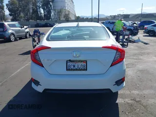 2018 Honda Civic EX with VIN 2HGFC2F71JH502564, listed as a IAAI auction lot 41933157 with 56,696 mi miles and . Bid and sale history available at DreamBid. Image 16.