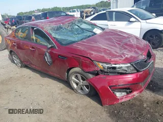 2015 Kia Optima LX z VIN 5XXGM4A75FG503066, wystawiony jako IAAI lot #42007170 z przebiegiem 128 918 mil mil oraz . Historia ofert i sprzedaży dostępna na DreamBid. Obrazek 1.