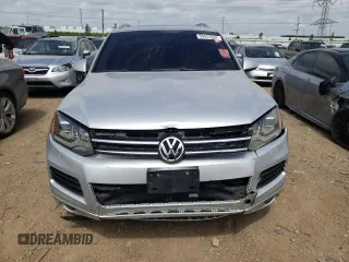 2012 Volkswagen Touareg Exec with VIN WVGEF9BP9CD009937, listed as a Copart auction lot 59622944 with Not Provided miles and Clean Title. Bid and sale history available at DreamBid. Image 5.