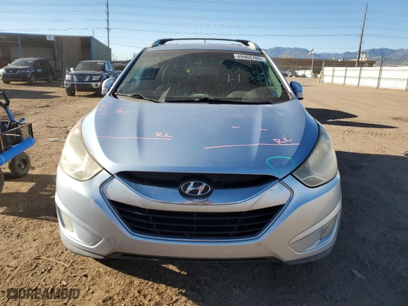 2012 Hyundai Tucson Limited with VIN KM8JU3AC3CU512217, listed as a Copart auction lot 49968705 with 208,742 mi miles and Clean Title. Bid and sale history available at carsss.com. Image 5.
