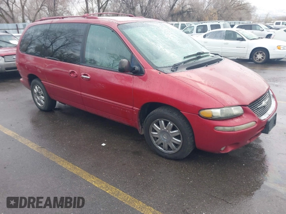 1999 Chrysler Town & Country with VIN 1C4GT64L7XB723937, listed as a IAAI auction lot 41609957 with 242,800 mi miles and . Bid and sale history available at DreamBid. Image 1.
