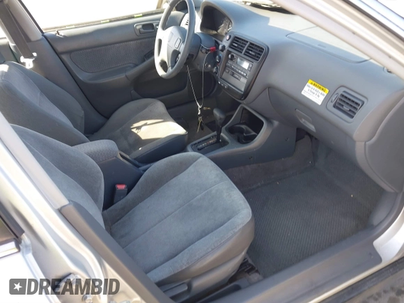 1999 Honda Civic LX with VIN JHMEJ6670XS000958, listed as a IAAI auction lot 41620949 with 93,698 mi miles and . Bid and sale history available at DreamBid. Image 5.