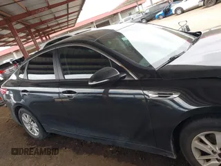 2016 Kia Optima LX with VIN KNAGT4L32G5111503, listed as a IAAI auction lot 42011975 with 114,476 mi miles. Bid and sale history available at carsss.com. Image 13.