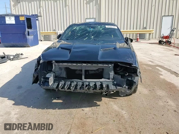 2015 Dodge Challenger SXT Plus z VIN 2C3CDZBG2FH723521, wystawiony jako Copart lot #52642195 z przebiegiem 145 834 mil mil oraz Szkoda całkowita • Salvage title. Historia ofert i sprzedaży dostępna na DreamBid. Obrazek 14.