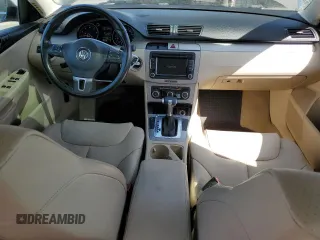 2010 Volkswagen Passat Komfort with VIN WVWJK7ANXAE129739, listed as a Copart auction lot 57798275 with 155,830 mi miles and Salvage title. Bid and sale history available at DreamBid. Image 8.