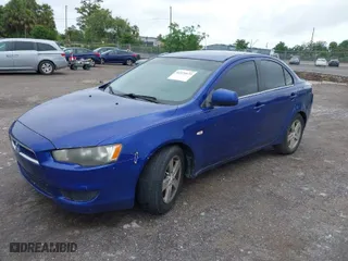 2008 Mitsubishi Lancer DE with VIN JA3AU26U68U037460, listed as a IAAI auction lot 41979573 with 220,238 mi miles. Bid and sale history available at carsss.com. Image 2.