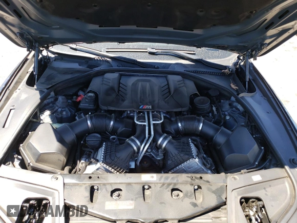2013 BMW M5 z VIN WBSFV9C50DC774172, wystawiony jako Copart lot #61990854 z przebiegiem Nie podano mil oraz Szkoda całkowita • Salvage title. Historia ofert i sprzedaży dostępna na DreamBid. Obrazek 11.