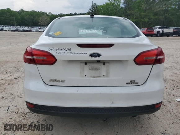 2016 Ford Focus SE with VIN 1FADP3F26GL369418, listed as a Copart auction lot 54256525 with 139,871 mi miles and Salvage title. Bid and sale history available at DreamBid. Image 6.