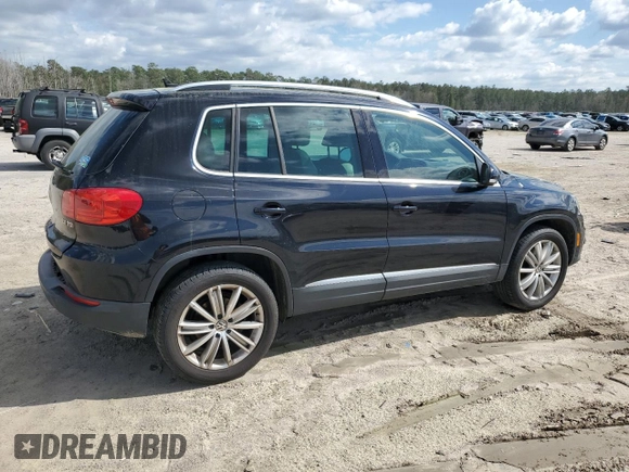 2012 Volkswagen Tiguan SE with VIN WVGAV7AX1CW610349, listed as a Copart auction lot 49250985 with 139,718 mi miles and Salvage Title. Bid and sale history available at DreamBid. Image 3.