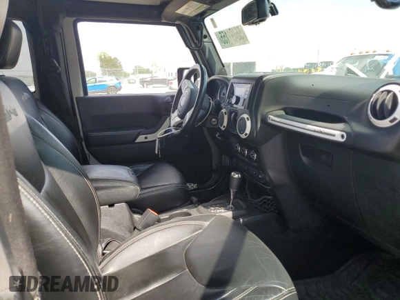 2014 Jeep Wrangler Sahara with VIN 1C4AJWBG0EL241643, listed as a Copart auction lot 56491155 with 113,596 mi miles and Salvage title. Bid and sale history available at DreamBid. Image 8.