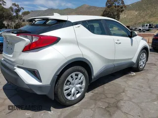 2020 Toyota C-HR LE with VIN JTNKHMBX3L1074882, listed as a IAAI auction lot 42064899 with 44,897 mi miles and . Bid and sale history available at DreamBid. Image 4.