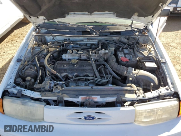 1994 Ford Escort z VIN 3FARP13J4RR122084, wystawiony jako Copart lot #73184804 z przebiegiem 238 604 mil mil oraz Nie do naprawy. Historia ofert i sprzedaży dostępna na DreamBid. Obrazek 11.