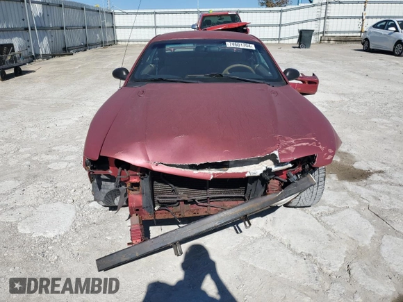 1997 Ford Mustang with VIN 1FALP4043VF109078, listed as a Copart auction lot 74601704 with 133,838 mi miles and Salvage Title. Bid and sale history available at carsss.com. Image 5.