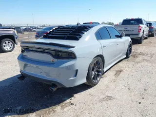 2021 Dodge Charger Scat Pack with VIN 2C3CDXGJ8MH539917, listed as a IAAI auction lot 41651136 with 53,314 mi miles. Bid and sale history available at carsss.com. Image 4.