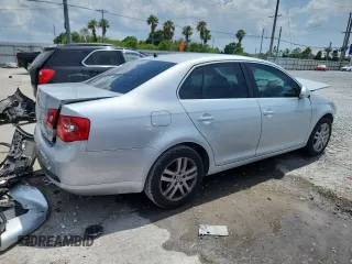 2007 Volkswagen Jetta Wolfsburg Edition z VIN 3VWEF71K57M189021, wystawiony jako Copart lot #59019685 z przebiegiem 124 720 mil mil oraz Szkoda całkowita • Salvage title. Historia ofert i sprzedaży dostępna na DreamBid. Obrazek 3.