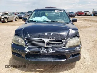 2002 Mitsubishi Lancer OZ-Rally z VIN JA3AJ86E32U001737, wystawiony jako Copart lot #59275695 z przebiegiem 177 332 mil mil oraz Szkoda całkowita • Salvage title. Historia ofert i sprzedaży dostępna na DreamBid. Obrazek 5.