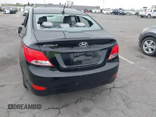 2015 Hyundai Accent GLS z VIN KMHCT4AE8FU827019, wystawiony jako IAAI lot #42179517 z przebiegiem 52 039 mil mil oraz . Historia ofert i sprzedaży dostępna na DreamBid. Obrazek 16.
