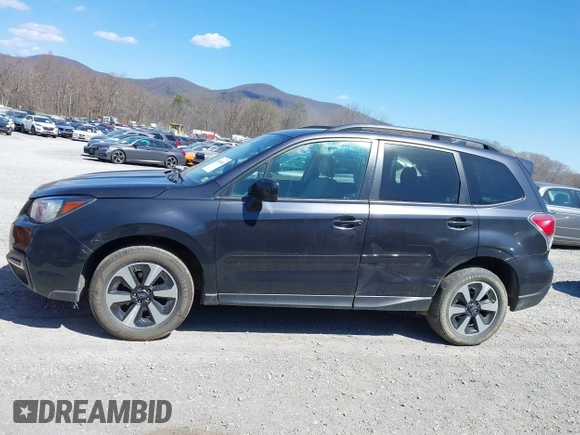 2018 Subaru Forester Premium with VIN JF2SJAGC4JH615487, listed as a IAAI auction lot 41854410 with 320,094 mi miles. Bid and sale history available at carsss.com. Image 15.