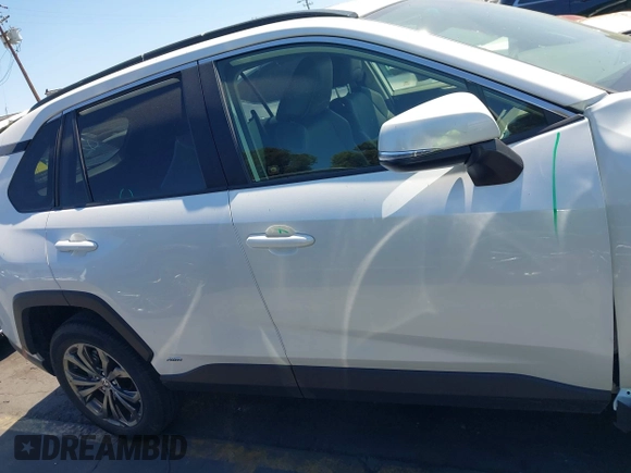 2023 Toyota RAV4 Hybrid XLE Premium with VIN JTMB6RFV0PD087237, listed as a IAAI auction lot 42606802 with 16,872 mi miles and . Bid and sale history available at DreamBid. Image 14.