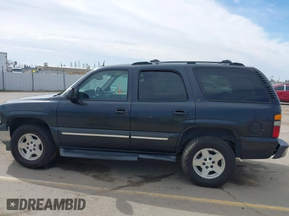 2005 Chevrolet Tahoe LS z VIN 1GNEK13T05J124225, wystawiony jako IAAI lot #41699401 z przebiegiem 253 632 mil mil oraz . Historia ofert i sprzedaży dostępna na DreamBid. Obrazek 14.